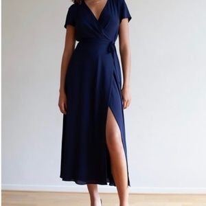 Brand new, still tagged Babaton navy wrap dress